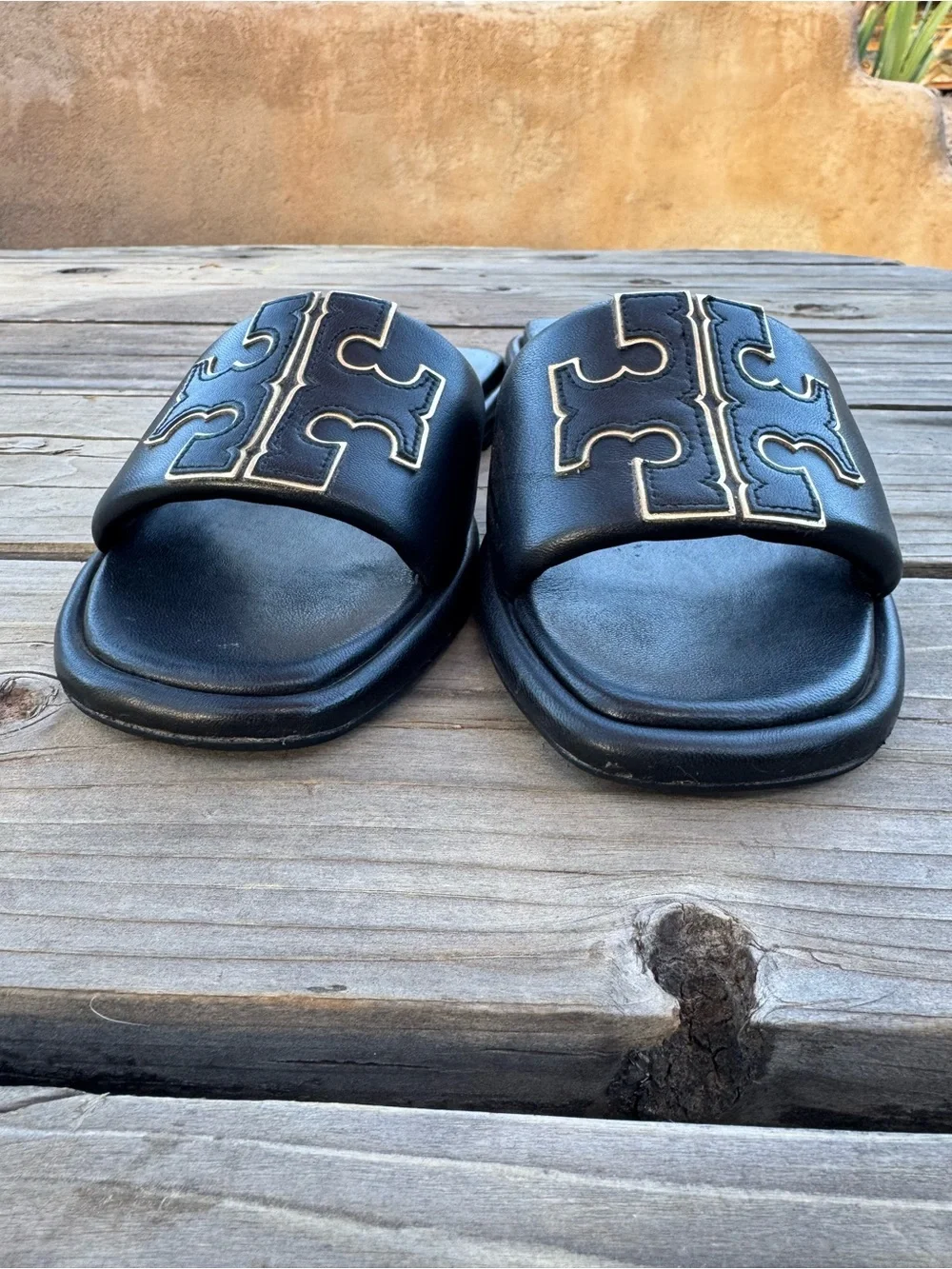 Tory Burch Black Slides with Gold Logo Stitching